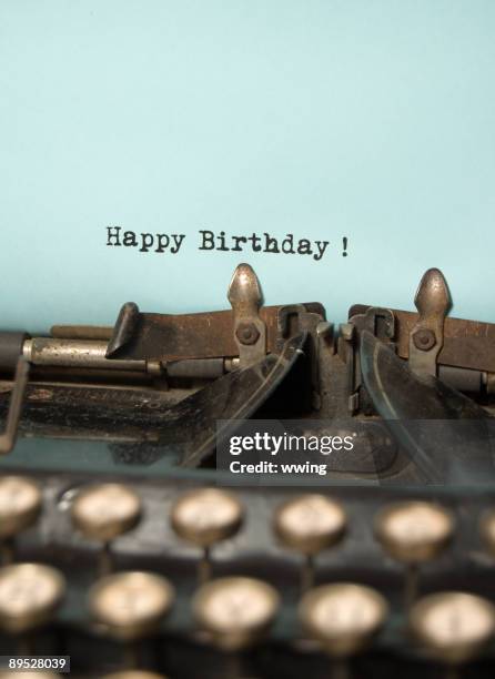 happy birthday on antique typewriter - happy birthday vintage stockfoto's en -beelden