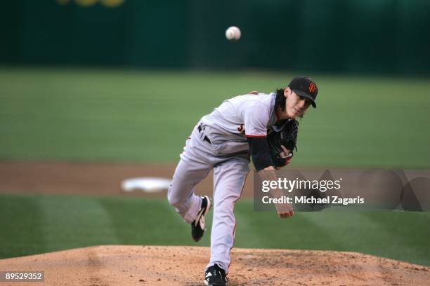 Tim Lincecum of the San Francisco Giants pitches during the game against the Oakland Athletics at the Oakland Coliseum on June 23, 2009 in Oakland,...