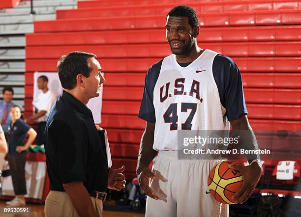 Greg Oden of the USA Men's National Basketball Team talks with coach Mike Krzyzewski during mini-camp on July 24, 2009 at Valley High School in Las...