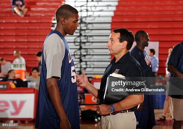 Kevin Durant of the USA Men's National Basketball Team talks with coach Mike Krzyzewski during mini-camp on July 24, 2009 at Valley High School in...