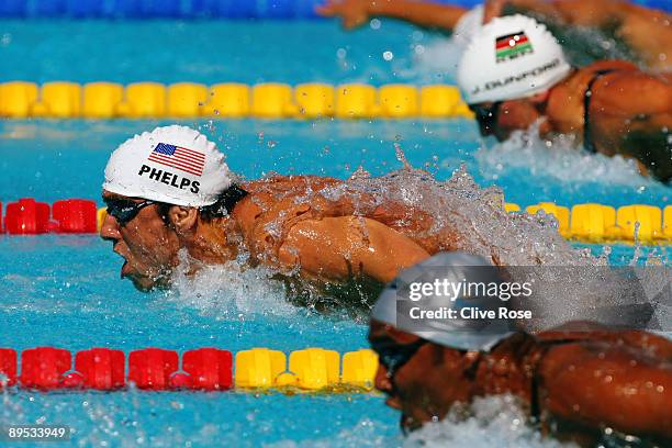 Michael Phelps of the United States competes in the Men's 100m Butterfly Heats during the 13th FINA World Championships at the Stadio del Nuoto on...