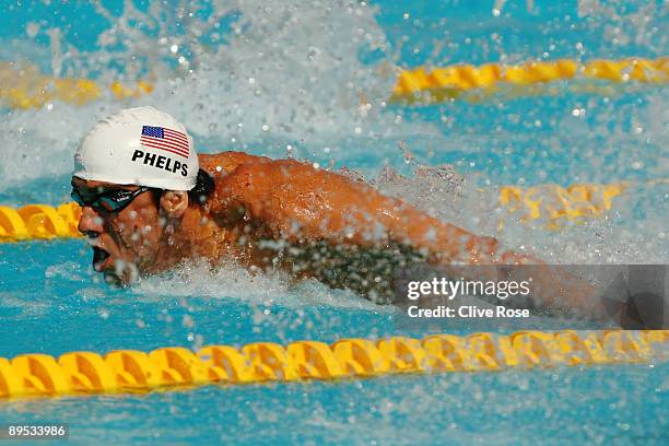 Michael Phelps of the United States competes in the Men's 100m Butterfly Heats during the 13th FINA World Championships at the Stadio del Nuoto on...