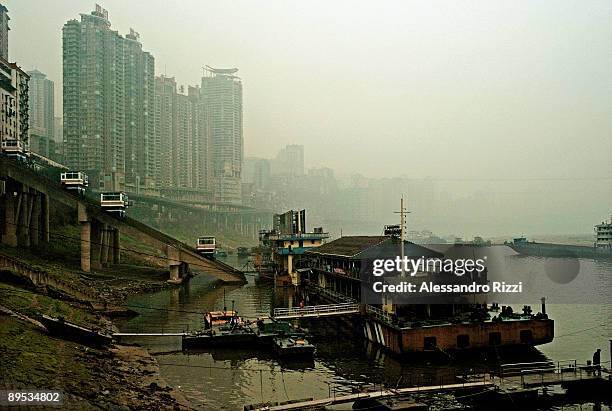 The lift used to deliver people to and from the Chaotianmen ferry in Chongqing. The city of Chongqing is one of the fastest-growing urban centres on...