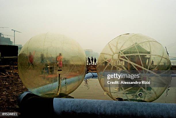 An attraction for visitors on Chaotianmen beach in Chongqing. The city of Chongqing is one of the fastest-growing urban centres on the planet. It is...