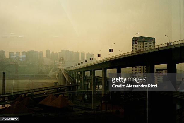 The view of the Huanghuayuan bridge, in Chongqing. The city of Chongqing is one of the fastest-growing urban centres on the planet. It is changing...