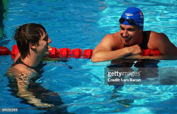 David Carry of Great Britain chats to Tommaso D'Orsogna of Australia after the Men's 4x 200m Freestyle Heats during the 13th FINA World Championships...