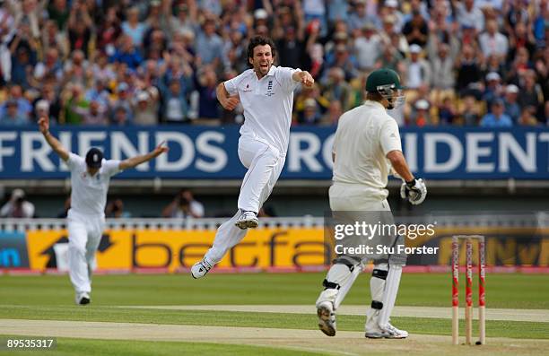 England bowler Graham Onions celebrates taking the wicket of Australian batsman Shane Watson off the first ball of the day during day two of the...