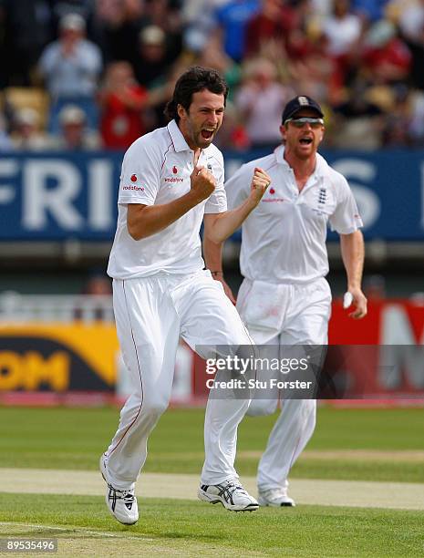 England bowler Graham Onions celebrates taking the wicket of Australian batsman Shane Watson off the first ball of the day during day two of the...