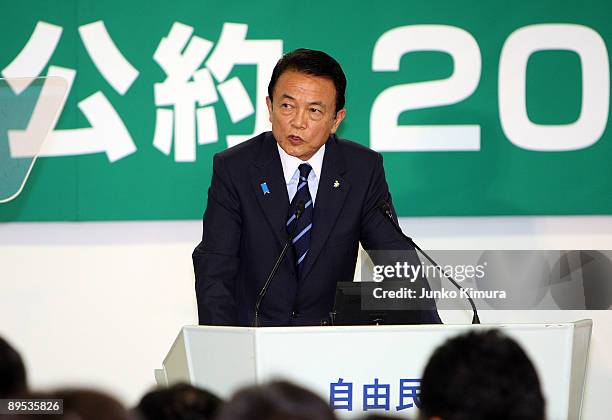 Prime Minister and President of Liberal Democratic Party Taro Aso speaks during the press conference at the LDP headquarters on July 31, 2009 in...