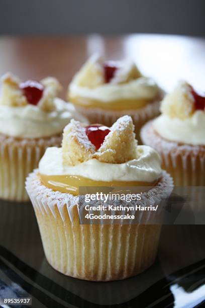 butterfly cakes - whip cream dollop stock pictures, royalty-free photos & images