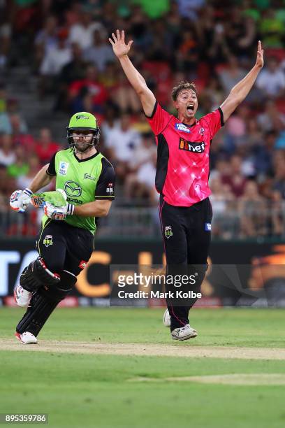Daniel Sams of the Sixers appeals unsuccessfully for the wickey of Aiden Blizzard of the Thunder during the Big Bash League match between the Sydney...
