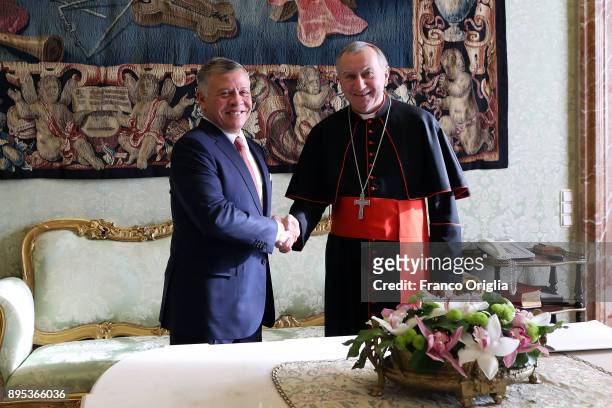Vatican Secretary of State cardinal Pietro Parolin meets King Abdullah II of Jordan at the Apostolic Palace on December 19, 2017 in Vatican City,...