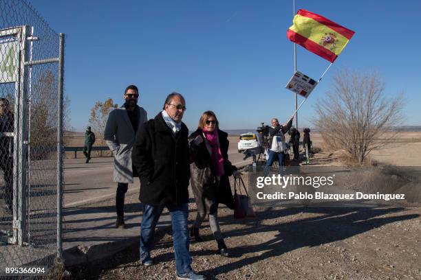 Spain pro-unity supporter waves a Spanish flag as Former President of the Catalan parliament Carme Forcadell and other supporters of jailed Catalan...