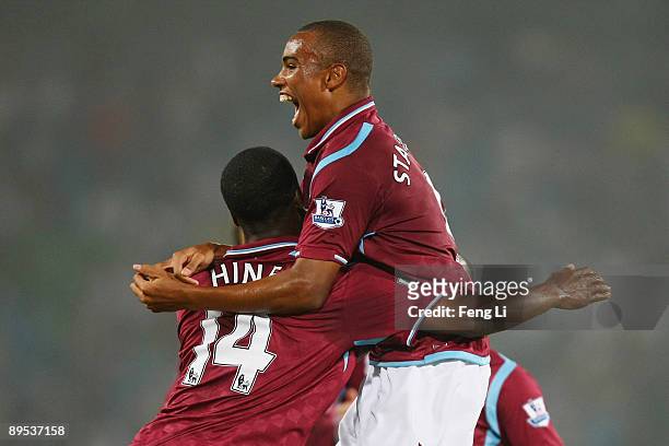 Zayon Albert Hines and Felix Stanislas of West Ham United celebrate scoring the second goal during the Barclays Asia Trophy pre-season friendly match...