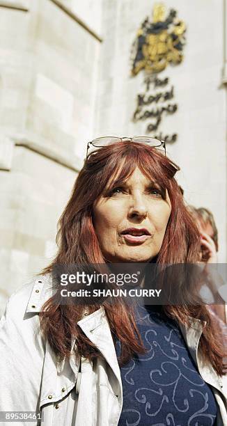 Janis Sharp, mother of Gary McKinnon, arrives at the High court in central London, on July 31, 2009. A Briton accused of hacking into US military and...