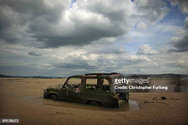 Car which was trapped by the infamous tides of Morcambe Bay rots away in the constantly moving and dangerous sands on July 31, 2009 in Morecambe,...