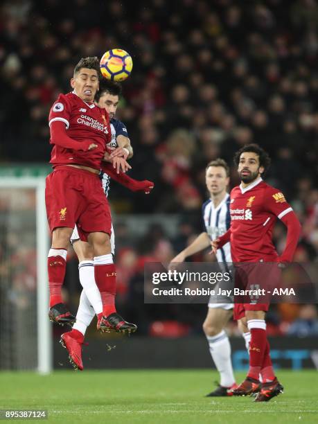 Roberto Firmino of Liverpool and Claudio Yacob of West Bromwich Albion during the Premier League match between Liverpool and West Bromwich Albion at...