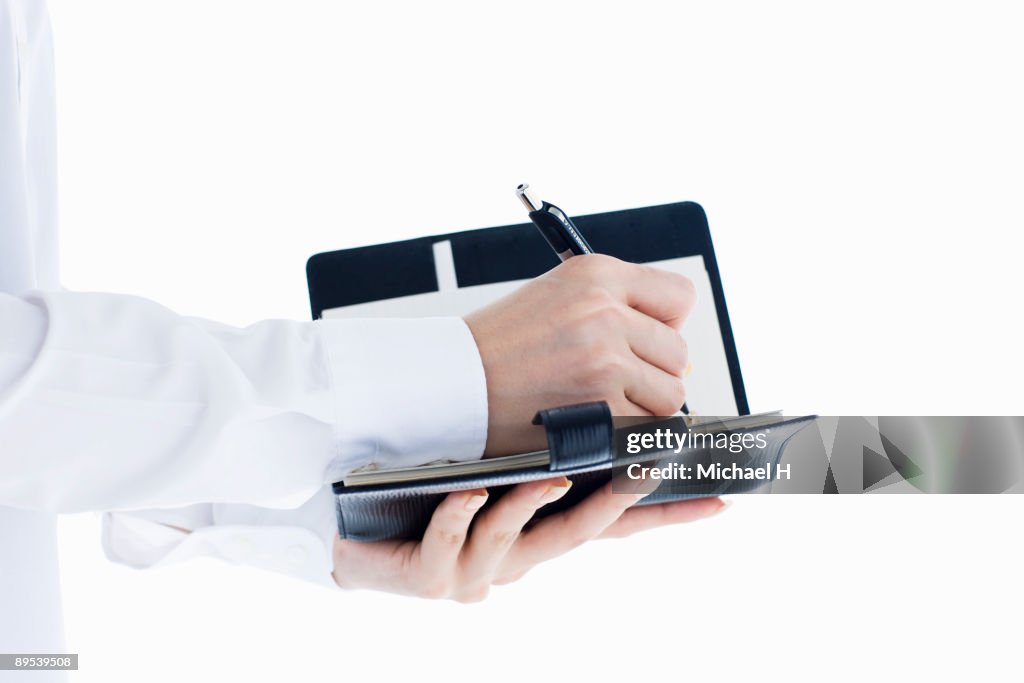 Take Note Hand Image Closeup Of Hand That Takes Notes High-Res Stock Photo - Getty Images