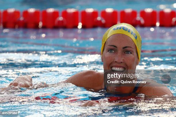 Therese Alshammar of Sweden celebrates after breaking the world record setting a new time of 25.07 seconds in the Women's 50m Butterfly Semi Final...
