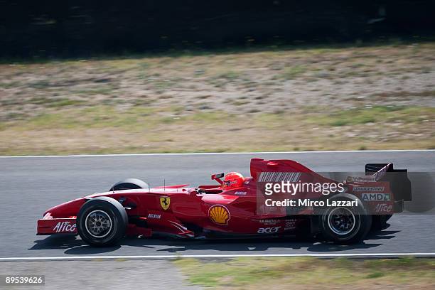 Michael Schumacher of Germany and Ferrari tests the Ferrari F2007 at the Mugello Circuit on July 31, 2009 in Scarperia, Italy. Schumacher retired...