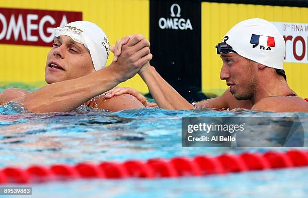 Frederick Bousquet of France, who came first and Cesar Cielo Filho of Brazil, who came second in the Men's 50m Freestyle Semi Fina during the 13th...