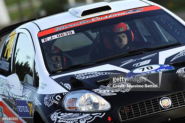 Kimi Raikkonen of Finland and Kaj Lindstrom of Finland compete in their Fiat Grande Punto S2000 during the Leg 1 of the WRC Neste Oil Rally of...