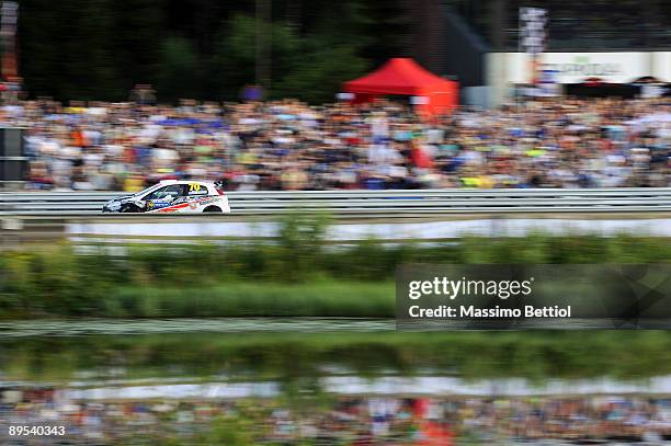 Kimi Raikkonen of Finland and Kaj Lindstrom of Finland compete in their Fiat Grande Punto S2000 during the Leg 1 of the WRC Neste Oil Rally of...