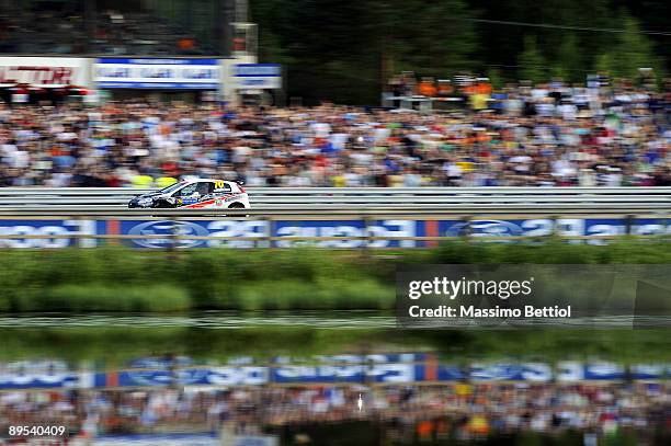 Kimi Raikkonen of Finland and Kaj Lindstrom of Finland compete in their Fiat Grande Punto S2000 during the Leg 1 of the WRC Neste Oil Rally of...