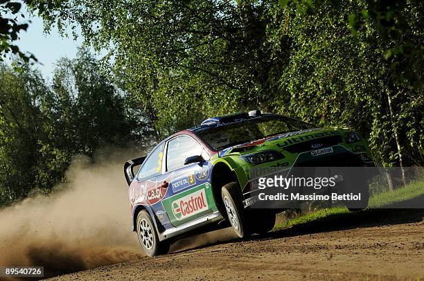 Mikko Hirvonen of Finland and Jarmo Lehtinen of Finland compete in their BP Abu Dhabi Ford Focus during Leg 1 of the WRC Neste Oil Rally of Finland...
