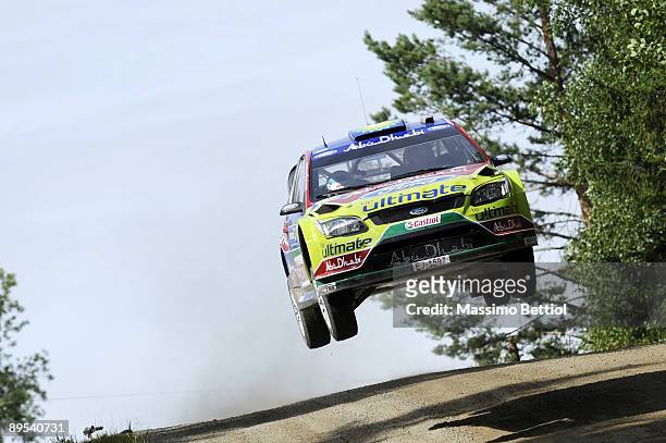 Mikko Hirvonen of Finland and Jarmo Lehtinen of Finland compete in their BP Abu Dhabi Ford Focus during Leg 1 of the WRC Neste Oil Rally of Finland...