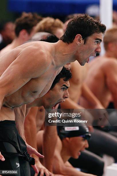 Michael Phelps and Ricky Berens of the United States roar on teammate Ryan Lochte in the Men's 4x 200m Freestyle Final at the 13th FINA World...