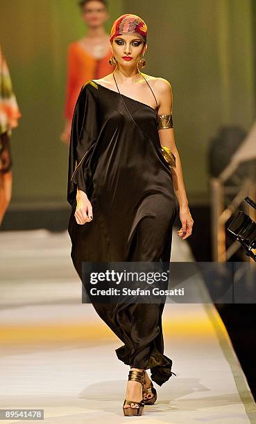 Model showcases a design by Almond Tree on the catwalk during the StyleAid Perth Fashion Event 2009 at the Burswood Entertainment Complex on July 31,...