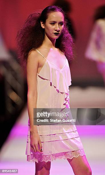 Model showcases a design by Flannel on the catwalk during the StyleAid Perth Fashion Event 2009 at the Burswood Entertainment Complex on July 31,...
