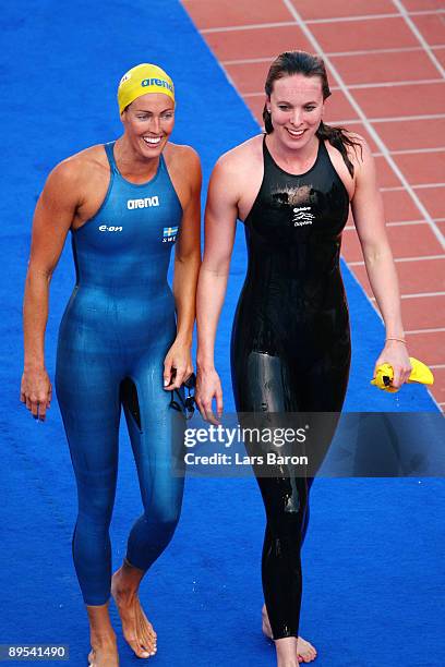 Therese Alshammar of Sweden after breaking the world record setting a new time of 25.07 seconds in the Women's 50m Butterfly Semi Final with Marieke...