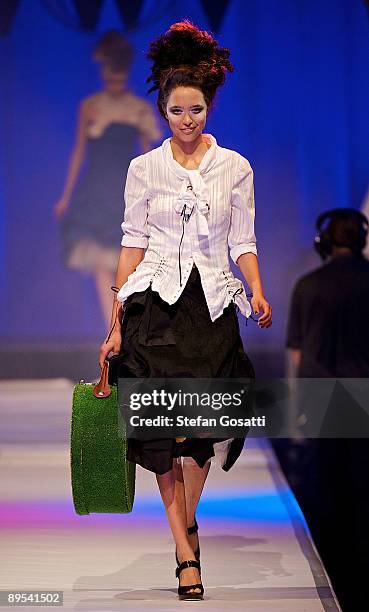 Model showcases a design by Mandi Mac on the catwalk during the StyleAid Perth Fashion Event 2009 at the Burswood Entertainment Complex on July 31,...