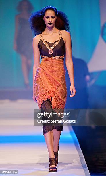 Model showcases a design by Love in Tokyo on the catwalk during the StyleAid Perth Fashion Event 2009 at the Burswood Entertainment Complex on July...