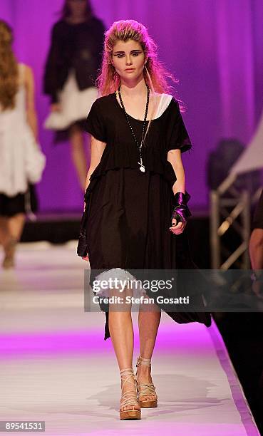 Model showcases a design by Empire Rose on the catwalk during the StyleAid Perth Fashion Event 2009 at the Burswood Entertainment Complex on July 31,...