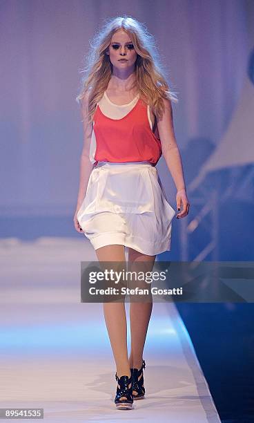 Model showcases a design by Carly Hunter on the catwalk during the StyleAid Perth Fashion Event 2009 at the Burswood Entertainment Complex on July...