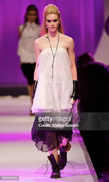 Model showcases a design by Empire Rose on the catwalk during the StyleAid Perth Fashion Event 2009 at the Burswood Entertainment Complex on July 31,...