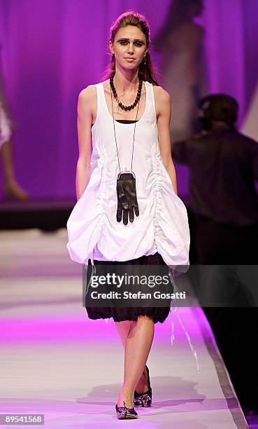 Model showcases a design by Empire Rose on the catwalk during the StyleAid Perth Fashion Event 2009 at the Burswood Entertainment Complex on July 31,...