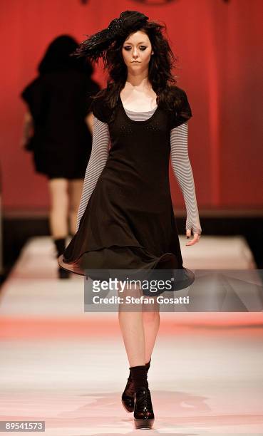 Model showcases a design by Antipodium on the catwalk during the StyleAid Perth Fashion Event 2009 at the Burswood Entertainment Complex on July 31,...