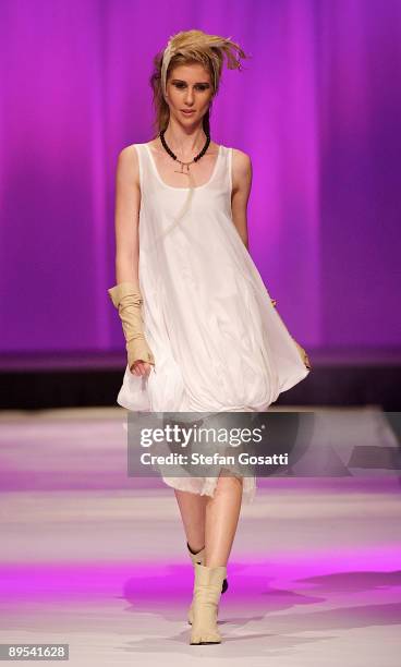 Model showcases a design by Empire Rose on the catwalk during the StyleAid Perth Fashion Event 2009 at the Burswood Entertainment Complex on July 31,...