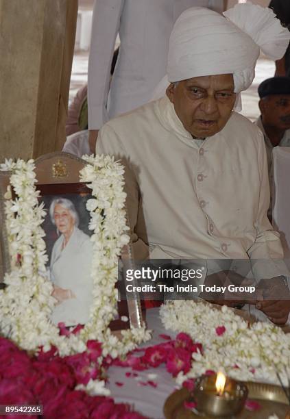 Former Maharaja of Jaipur Brigadier Bhawani Singh paying flowring tribute to the Raja Mata Gayatri Devi body at the city palace on Thursday in Jaipur.