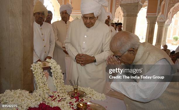 Rajasthan Governor S K Singh paying flowring tribute to the Raja Mata Gayatri Devi body at the city palace on Thursday in Jaipur also seen in the...