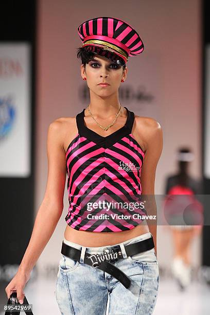 Model walks the runway wearing Divino by Daniel Hoyos during the second day of Colombia Moda 2009 at Plaza Mayor on July 28, 2009 in Medellin,...