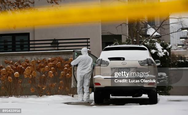 Forensic investigators continued their activities at 50 Old Colony Road following the suspicious deaths of Barry Sherman and his wife Honey. Flowers...