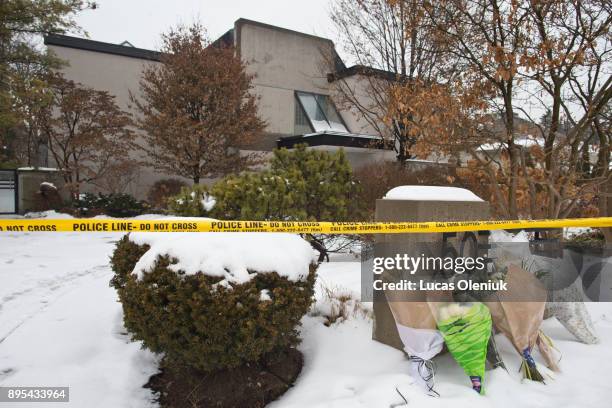 Forensic investigators continued their activities at 50 Old Colony Road following the suspicious deaths of Barry Sherman and his wife Honey. Flowers...