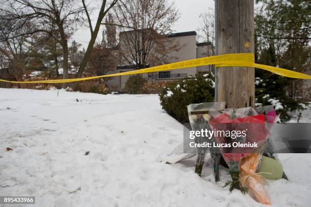 Forensic investigators continued their activities at 50 Old Colony Road following the suspicious deaths of Barry Sherman and his wife Honey. Flowers...