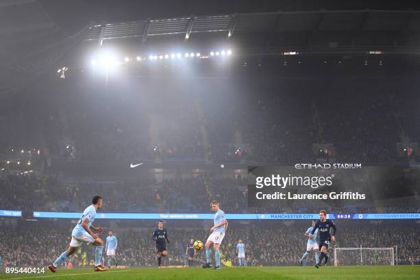 Kevin De Bruyne of Manchester City passes the ball to Gabriel Jesus during the Premier League match between Manchester City and Tottenham Hotspur at...