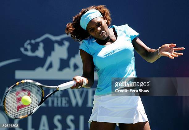 Serena Williams returns a shot to Samantha Stosur of Australia during their quarterfinal match on Day 5 of the Bank of the West Classic July 31, 2009...